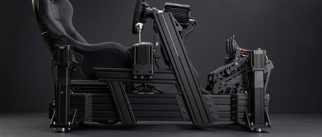 Black aluminum IMMERSIM rig with actuators, shifter and pedals, side view